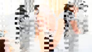 stressed couple sitting in bed